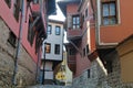 PLOVDIV, BULGARIA Ã¢â¬â AUGUST 1, 2015: A narrow street with colorful traditional houses in the old town of Plovdiv